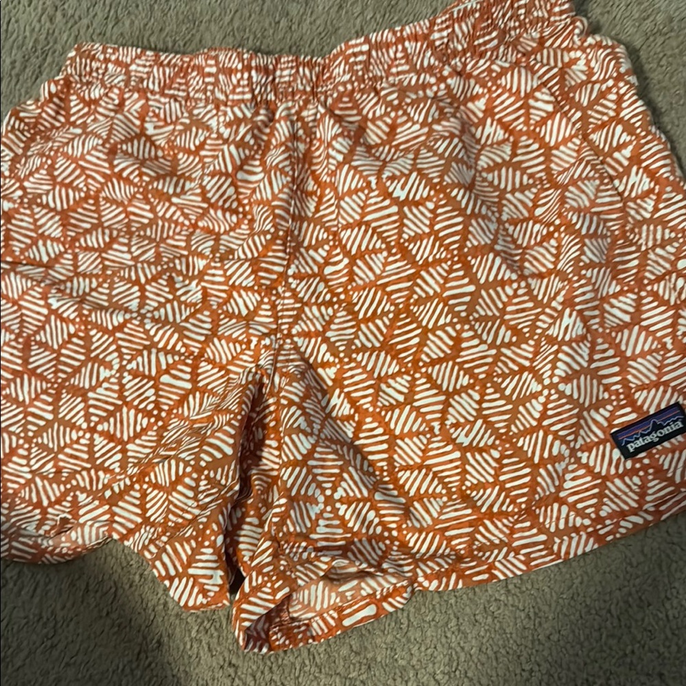 Patagonia Orange and White Athletic Shorts with Geometric Pattern